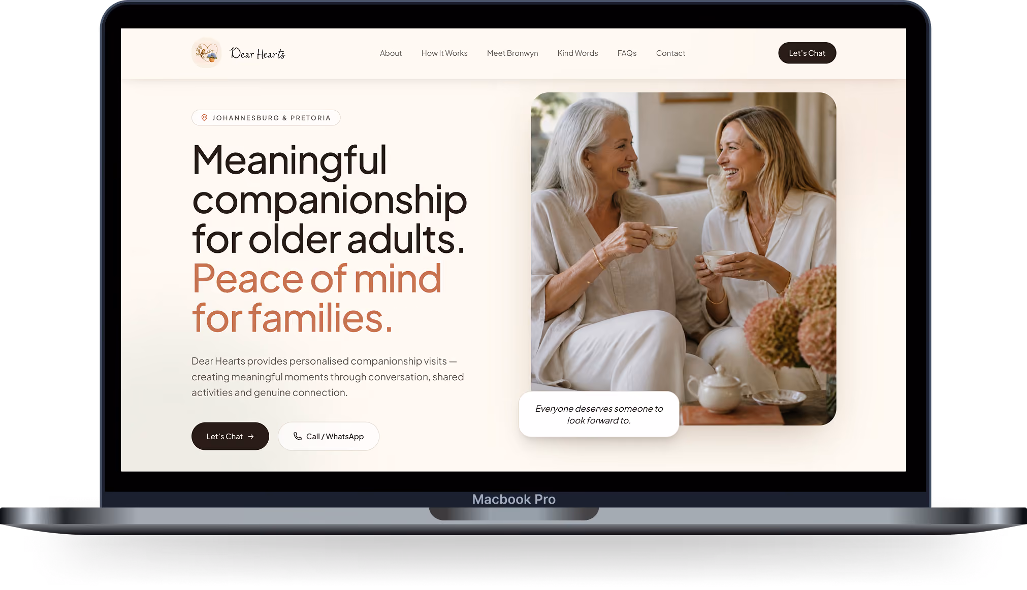 Website homepage showing companionship service for older adults with two women smiling and drinking tea.