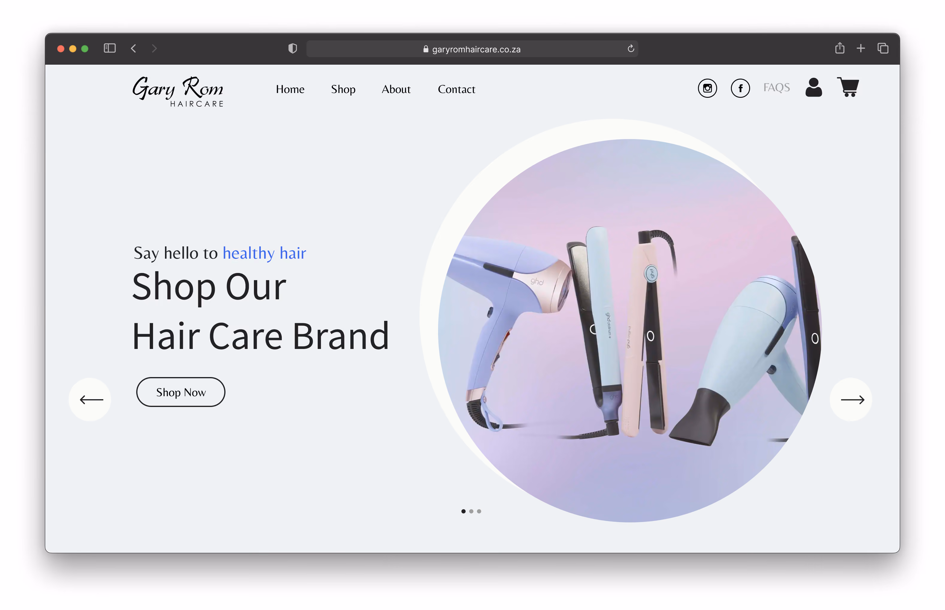 Website homepage showing haircare tools including hair dryers and flat irons arranged in a circle.